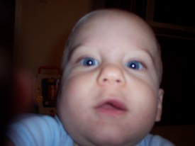 Sat May 27 19:40:50 2006

Andrew's first bloody and fat lip, the result of a trip and fall into the corner of the coffee table.