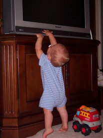 Mon Jul 31 14:11:48 2006

...he can now reach the TV's power button, and has long known what it does!
