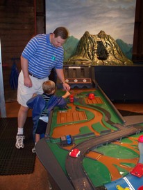 Sat 12 Jul 2008 10:44:52 AM

Dad and Andrew float boats in one of the water features at the South Carolina Children's Museum in Charleston.