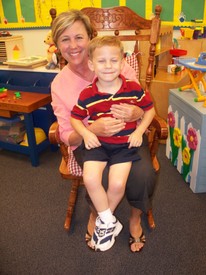Thu 20 Aug 2009 03:06:37 PM

Andrew and his Pre-K teacher, Ms. Ross, on orientation day.