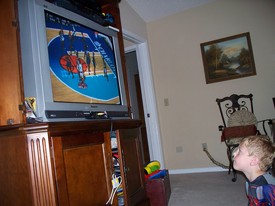 Sun 31 Oct 2010 06:36:17 PM

Halloween was a challenge this year with us just 4 months into the T1DM diagnosis. Instead of candy we bought Andrew gifts. This is a picture of Andrew playing his new NBA Play Station game.