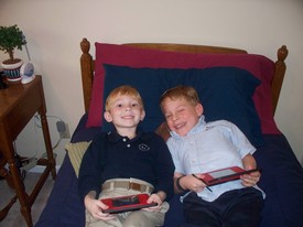Tue 18 Jan 2011 03:10:36 PM

Andrew with his friend Brandon Bunn and their matching Nintendo DSi XL game systems...