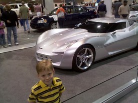 Sat 19 Feb 2011 11:16:53 AM

Andrew and Dad went to the JAX Auto Show again this year. This is a shot of Andrew in front of a GM Corvette concept car.