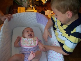 Thu 24 Mar 2011 04:57:59 PM

Andrew visits with Paige at Grandmother's and Grandaddy's house.