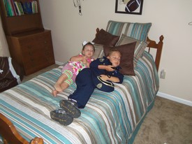 Mon 18 Jun 2012 09:16:15 AM

Gracie watches Andrew play his Wii.