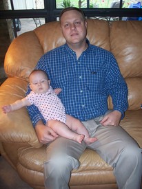 Wed 30 Sep 2009 06:03:42 PM

Dad and Gracie just before Mom and Dad went out to dinner to celebrate Mom's birthday.  Nana and Papa watched the kids.