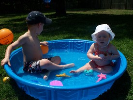 Thu 22 Apr 2010 02:00:19 PM

Andrew and Gracie enjoy an afternoon in the kiddie pool.  Dad was out of town for a job interview.