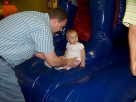 Sat 24 Apr 2010 12:30:59 PM

Dad helps Gracie bounce a little at Andrew's JumpZone birthday party.
