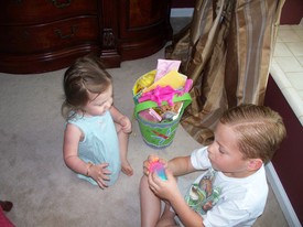 Sun 24 Apr 2011 08:25:36 AM

Gracie and Andrew check out Gracie's Easter basket.